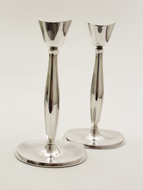 A pair of Cohr 830 silver candlesticks sold