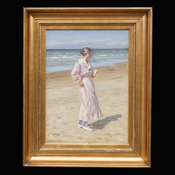 N. F. Schiøttz-Jensen, 1855-1941: Woman at the beach at Lønstrup, Denmark. Oil 
on canvas. Signed and dated 1916. Visible size: 48x34cm. With frame: 66x80cm