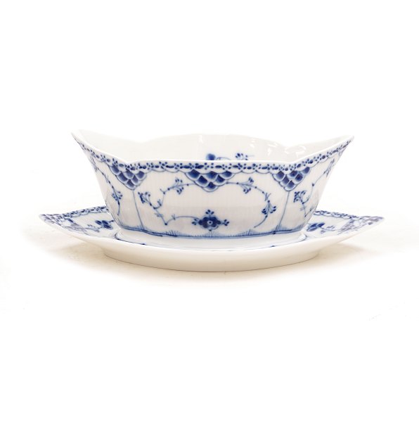 Royal Copenhagen: A blue fluted half lace sauceboat. #1/587. L: 26cm