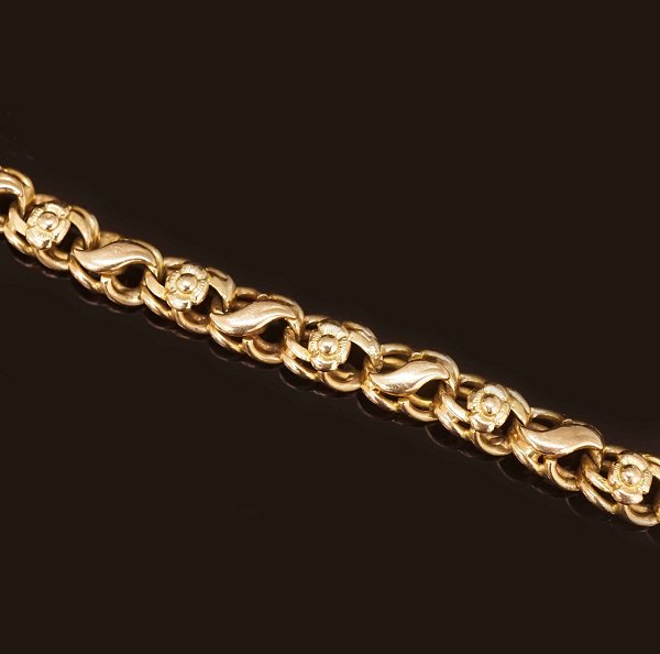 A 14kt gold Evald Nielsen Art Nouveau bracelet. L: 18,5cm