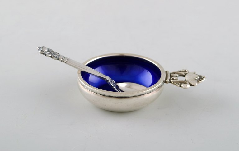 Johan Rohde for Georg Jensen. "Acorn" salt cellar in sterling silver with blue 
enamel and salt spoon.