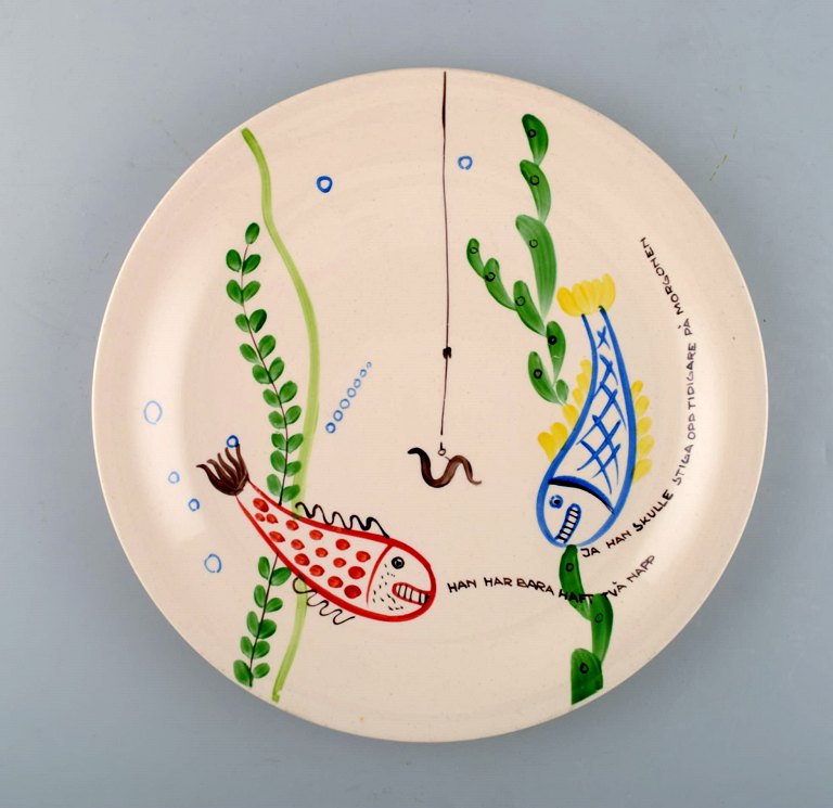 Stig Lindberg for Gustavsberg. "Löja" plate. Hand painted with fish motifs. 
1950