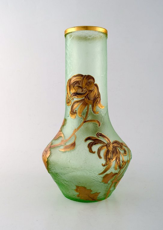 Montjoye, France. Large art nouveau vase in mouth-blown art glass. Decorated 
with flowers in enamel work, gilt. High quality vase. Dated 1880-1900.