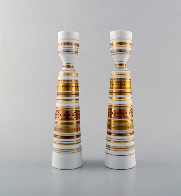 Bjørn Wiinblad for Rosenthal Studioline, quatre couleurs, Bjørn Wiinblad pair of 
candlesticks made of porcelain, decorated in gold. 1980