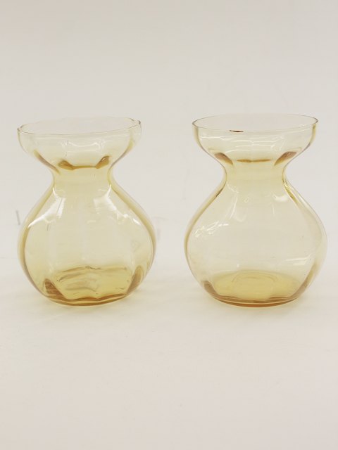 A pair of Holmegård yellow hyacinth glass