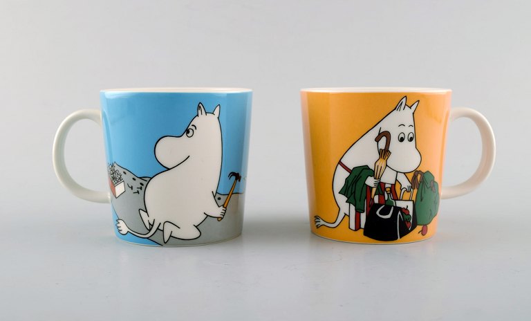 Arabia, Finland. Two cups in porcelain with motifs from "Moomin". Late 20th 
century.
