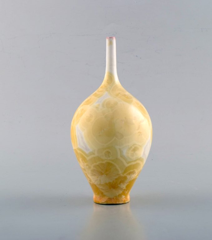 Isak Isaksson, Swedish ceramist. Narrow necked unique vase in glazed ceramics. 
Beautiful crystal glaze. Own workshop, approx. 2010. High quality contemporary 
ceramics.
