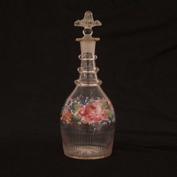 Enamel rose decorated decanter. Made circa 1860. H: 28cm