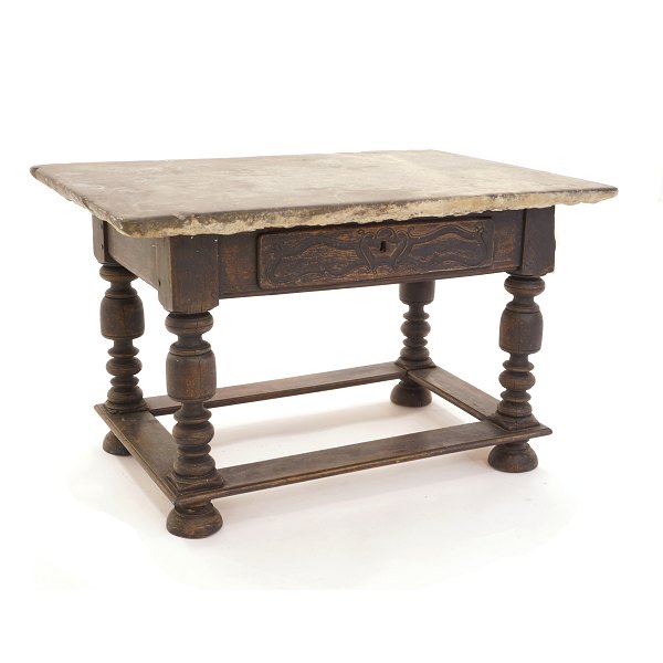 A Danish 18th century Baroque stone top table. The lower part black painted. 
Denmark circa 1750. H: 77cm. Top: 83x125cm