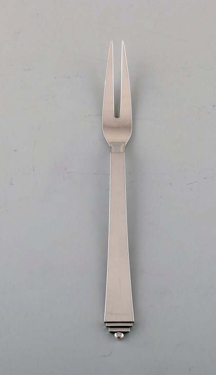 Large Georg Jensen "Pyramid" cold meat fork in sterling silver.
