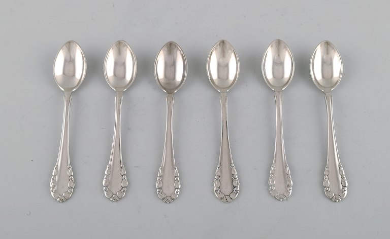 Georg Jensen "Lily of the Valley". Six coffee spoons in sterling silver / all 
silver. Dated 1915-30.
