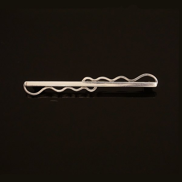 Karl Gustav Hansen, Kolding, Denmark, ca. 1937: A sterlingsilver brooch. L: 
7,8cm