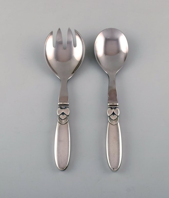 Georg Jensen "Cactus" salad set in sterling silver and stainless steel.
