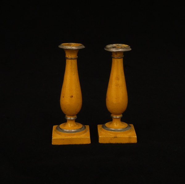 A pair of 19th century small yellow decoarated pewter candlesticks. Denmark 
circa 1830. H: 10cm