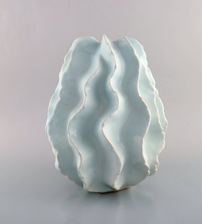 Scandinavian ceramist. Coral shaped vase in glazed ceramics. Beautiful light 
turquoise glaze. Late 20th century.
