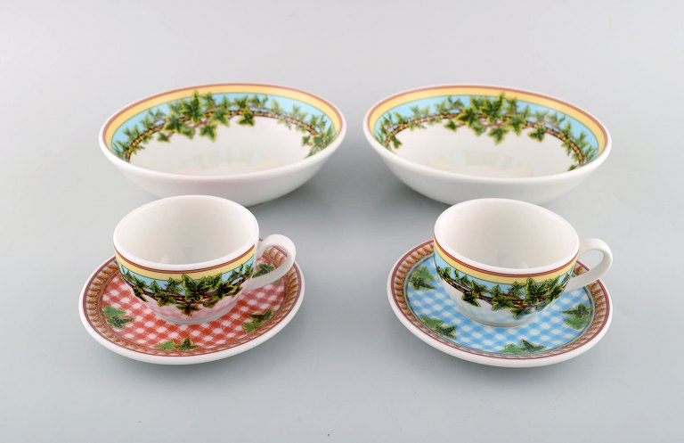 Gianni Versace for Rosenthal. Two "Ivy Leaves" cups with saucers and two bowls. 
Late 20th century.
