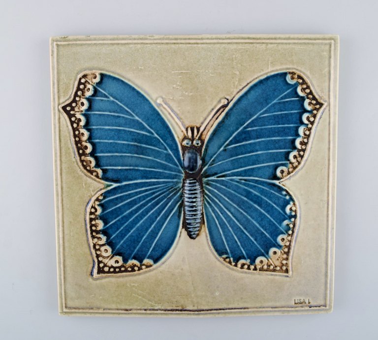 Lisa Larson for Gustavsberg. Wall plaque in glazed ceramics with butterfly. 
1970