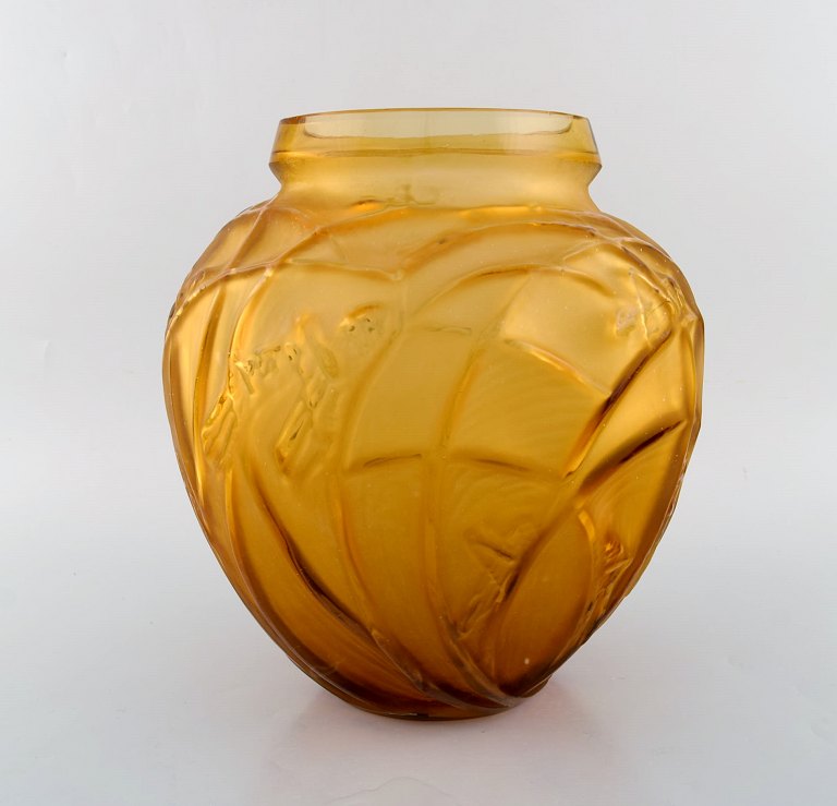 Early and large René Lalique "Sauterelles" vase in rare amber colored art glass 
with grasshoppers. Model 888. Ca 1912.
