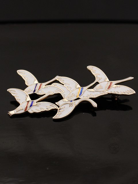 Magnussen, Erik. Silver brooch with enamel. "The five Nordic swans"