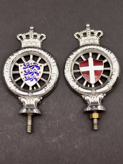 A pair of KDAK emblems