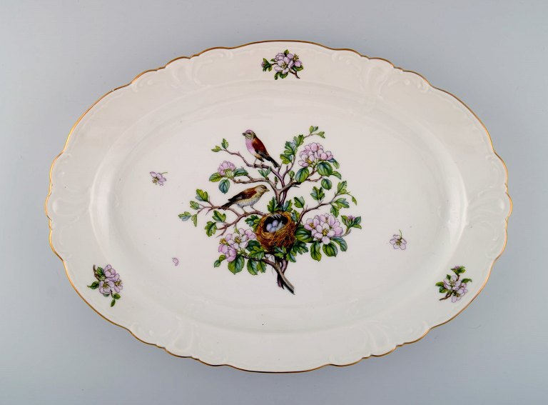 Royal Copenhagen "Spring" porcelain dish with motifs of birds and foliage. 
1980s. Model number: 1533/2509.
