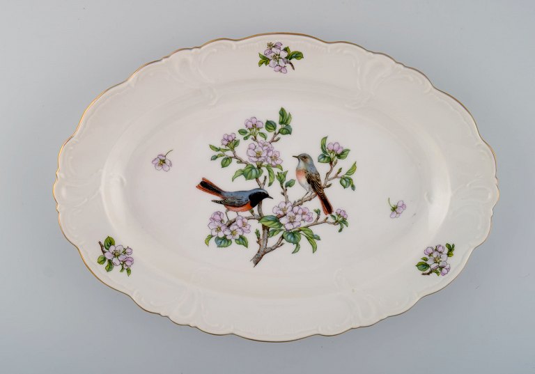 Royal Copenhagen "Spring" porcelain dish with motifs of birds and foliage. 
1980s. Model number: 1533/2508.
