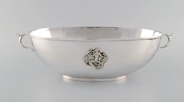 Just Andersen for GAB. Large art deco jardiniere in plated silver decorated with 
mermaids. 1930