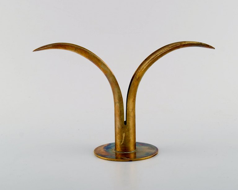 Modernist candlestick in brass. 1960s.
