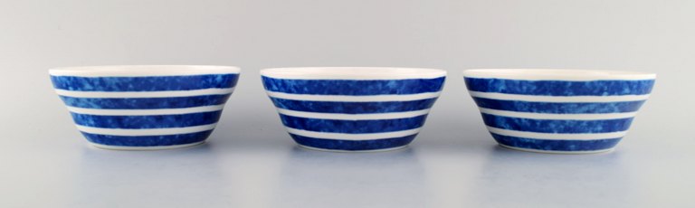Jackie Lynd for Duka. Three bowls in glazed ceramics with blue striped 
decoration. Swedish design, early 21st century.
