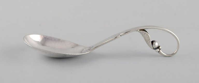 Early Georg Jensen jam spoon in sterling silver. Dated 1915-30.
