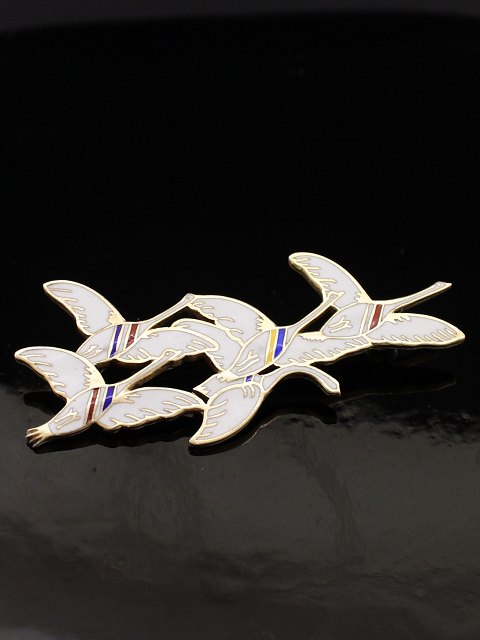 Magnussen, Erik. Silver brooch with enamel. "The five Nordic swans"