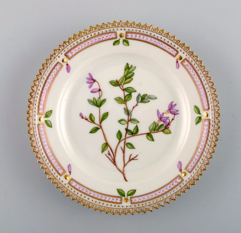 Royal Copenhagen Flora Danica side plate in hand-painted porcelain with flowers 
and gold decoration. Model number 20/3552.
