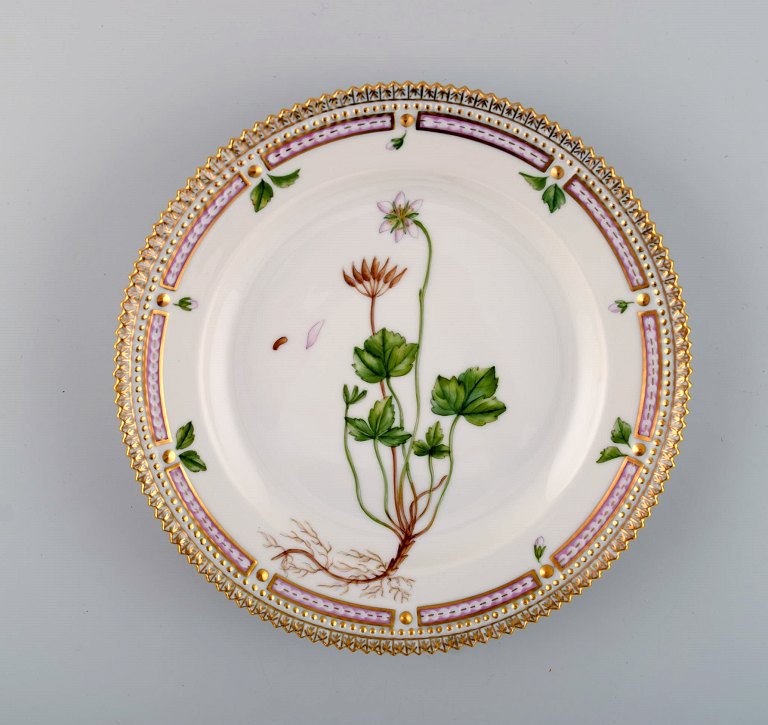 Royal Copenhagen Flora Danica salad plate in hand-painted porcelain with flowers 
and gold decoration. Model number 20/3573.
