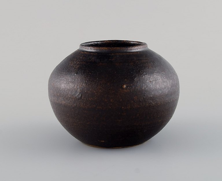 European studio ceramist. Round vase in glazed ceramics. Beautiful glaze in 
brown shades. 1970 / 80s.

