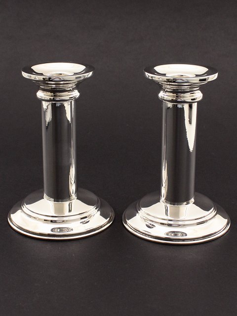 A pair of sterling silver candlesticks