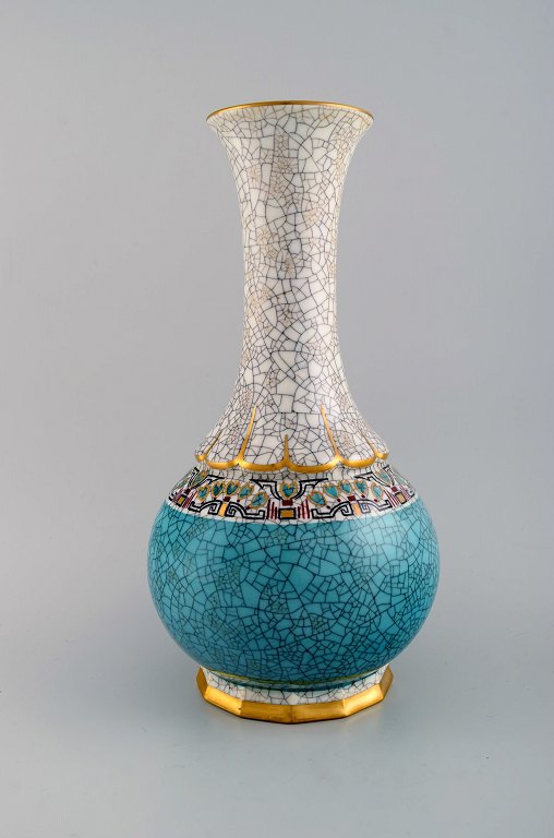 Stor Dahl Jensen vase i krakeleret porcelæn med guld og turkis dekoration. 
1930