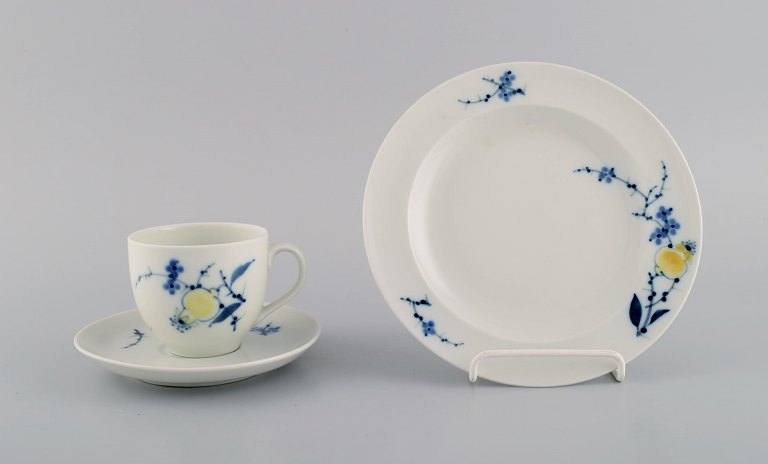 Johannes Hedegaard for Royal Copenhagen. Rare Rimmon coffee cup with saucer and 
plate in hand-painted porcelain. Dated 1967. Model number 46/14819.
