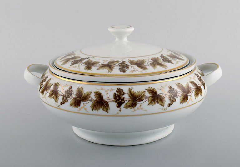 Round Limoges porcelain lidded tureen with hand-painted grape vines and gold 
decoration. 1930s / 40s.
