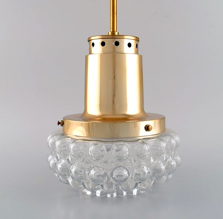 Helena Tynell (b. 1918, d. 2016) for Limburg. Ceiling pendant in clear art glass 
and brass. 1970s.
