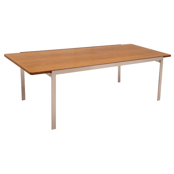 An Arne Jacobsen, Denmark, coffee table with teak top. Nice condition. H: 48cm. 
Top: 150x60cm