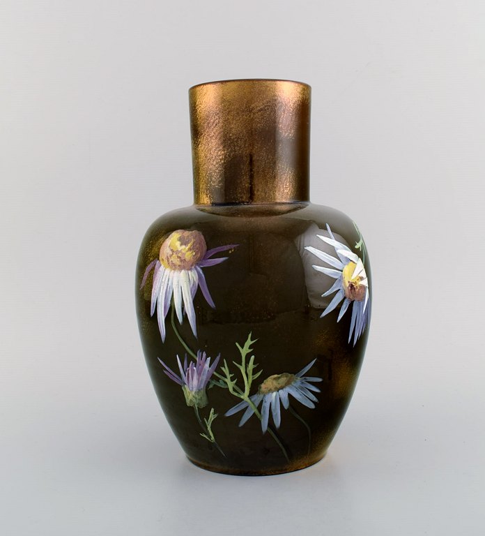 Clément Massier for Golfe Juan. Antique vase in glazed ceramics. Beautiful 
luster glaze with hand-painted flowers. Late 19th century.
