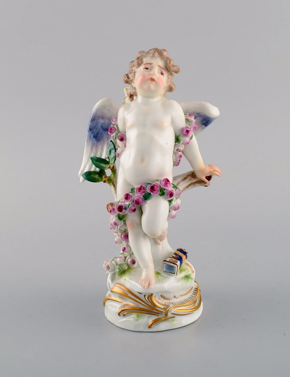 Antique Meissen figure in hand-painted porcelain. Chained cupid. Late 19th 
century.
