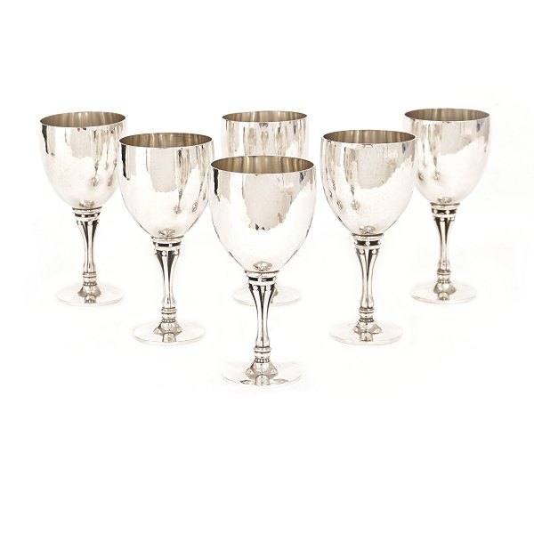 A set of 6 sterlingsilver wine goblets by Harald Nielsen for Georg Jensen. 
#532A. H: 12,5cm. W: 766gr