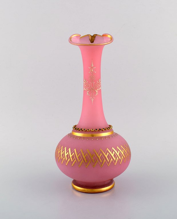 Large vase in pink mouth-blown art glass decorated with 24 carat gold leaf. 
Italy, ca 1900.
