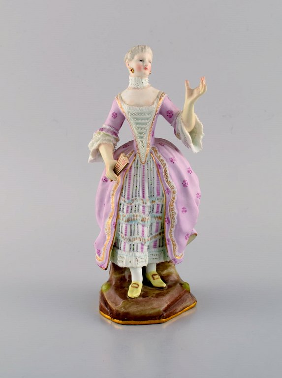 Antik Meissen porcelænsfigur. Festklædt nobel dame med vifte. Sent 1800-tallet.
