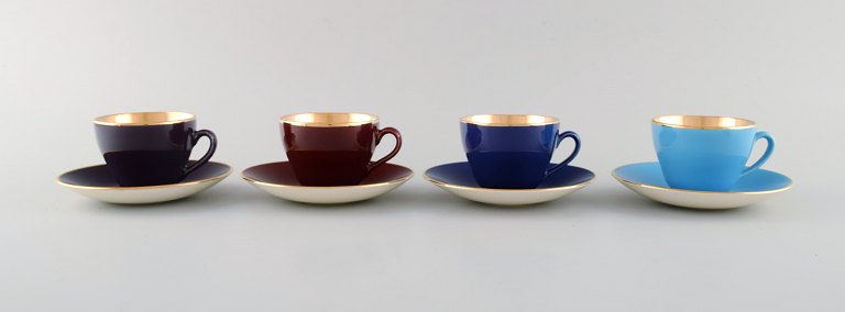 Four Royal Copenhagen / Aluminia Confetti coffee cups with saucers in glazed 
faience. Mid-20th century.
