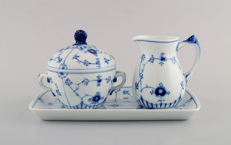 Bing & Grøndahl blue fluted sugar bowl and creamer on serving tray. Mid 20th 
century.
