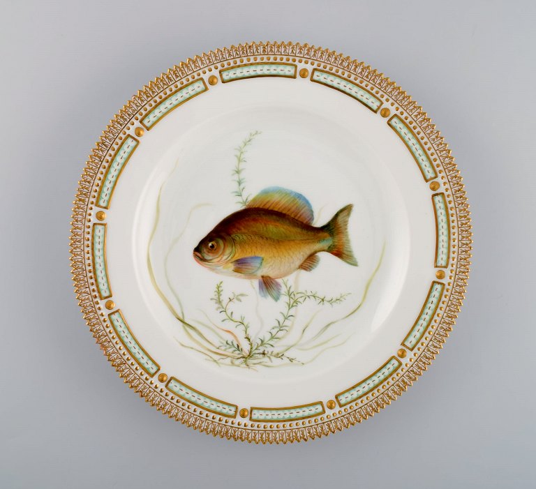 Royal Copenhagen Fauna Danica fish plate in hand-painted porcelain with fish and 
gold decoration. Model number 19/3549.
