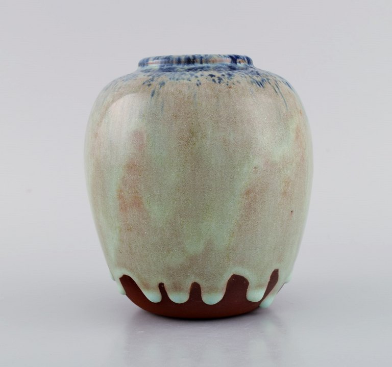 Pieter Groeneveldt (1889-1982), Dutch ceramicist. Unique vase in glazed 
ceramics. Beautiful running glaze. Mid-20th century.
