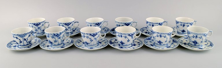 Twelve Royal Copenhagen Blue Fluted Half Lace coffee cups with saucers. 1960s. 
Model number 1/528.
